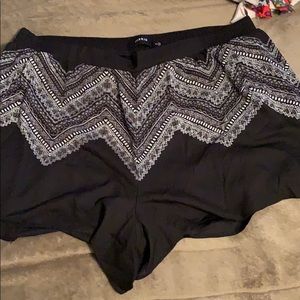 Shorts with extra lacing underneath